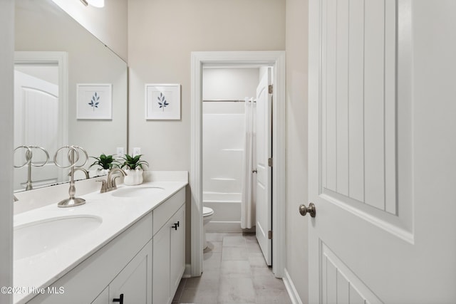 438 Sugar Cove Run, Wilmington, NC 28411 - full bath with double vanity, toilet, tub / shower combination, and baseboards