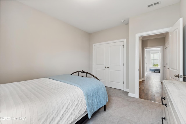 438 Sugar Cove Run, Wilmington, NC 28411 - bedroom with baseboards, a closet, and carpet