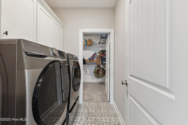 438 Sugar Cove Run, Wilmington, NC 28411 - laundry area with washer and dryer, cabinet space, light carpet, and light tile patterned floors