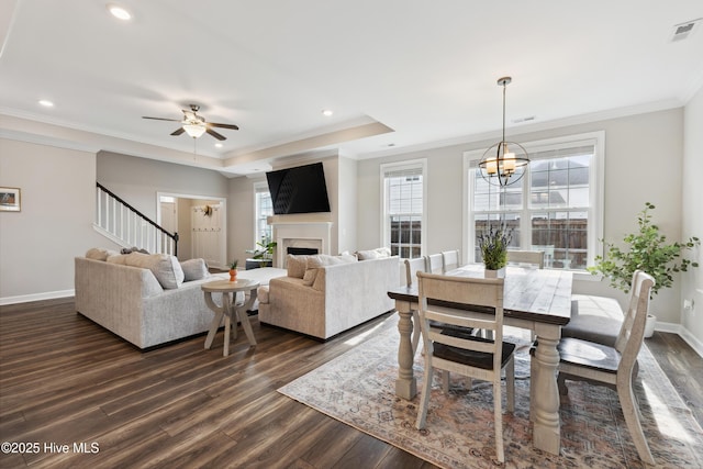 438 Sugar Cove Run, Wilmington, NC 28411 - dining room with dark wood-style flooring, baseboards, ornamental molding, ceiling fan, and recessed lighting