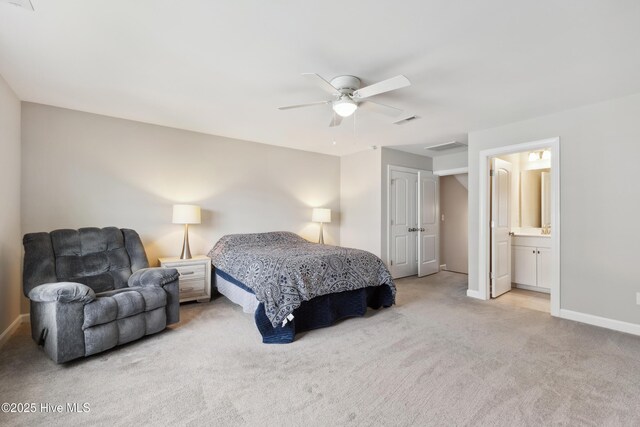 438 Sugar Cove Run, Wilmington, NC 28411 - bedroom with carpet, baseboards, ensuite bathroom, and a ceiling fan
