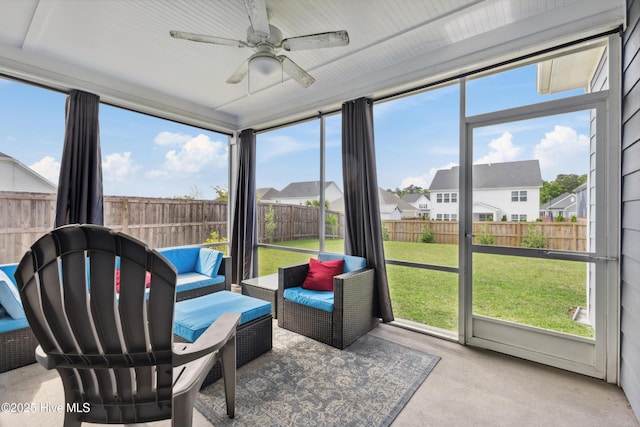 438 Sugar Cove Run, Wilmington, NC 28411 - sunroom with a ceiling fan, outdoor lounge area, and a residential view