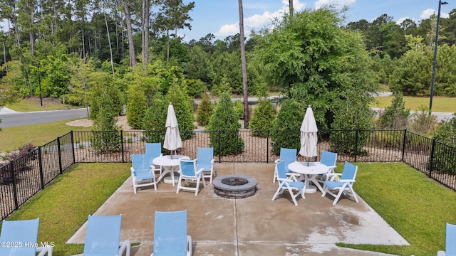 438 Sugar Cove Run, Wilmington, NC 28411 - view of patio / terrace featuring a fire pit and outdoor dining space