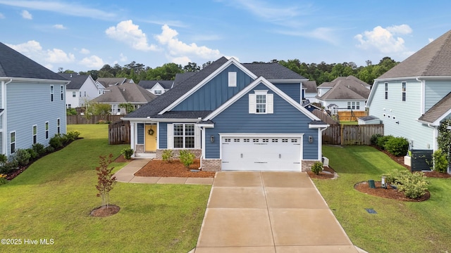 438 Sugar Cove Run, Wilmington, NC 28411 - view of front of house with board and batten siding, driveway, brick siding, a garage, and a residential view