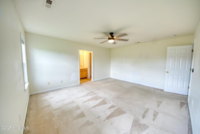 7308 Peppercorn Ct, Wilmington, NC 28411 - empty room featuring a ceiling fan, light carpet, baseboards, and plenty of natural light