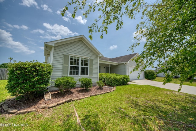 7308 Peppercorn Ct, Wilmington, NC 28411 - ranch-style home featuring concrete driveway, a garage, and a front lawn
