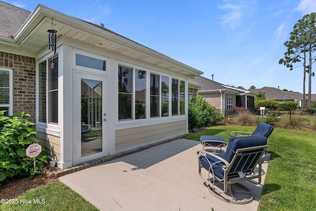 2169 Whiskey Branch Dr, Wilmington, NC 28409 - view of patio / terrace featuring a sunroom