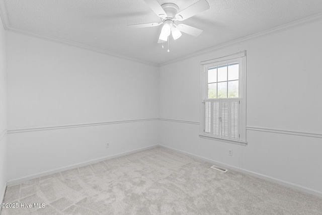 1205 Logan Ct, Jacksonville, NC 28540 - unfurnished room with crown molding, carpet floors, a textured ceiling, baseboards, and ceiling fan