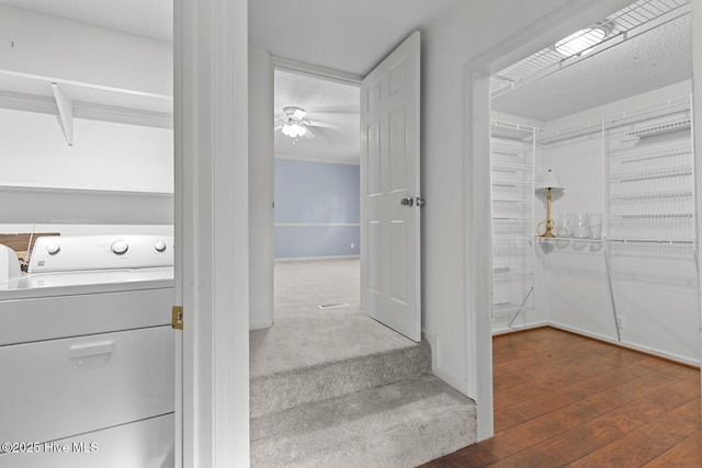 1205 Logan Ct, Jacksonville, NC 28540 - stairs featuring washer / clothes dryer, ceiling fan, and wood finished floors