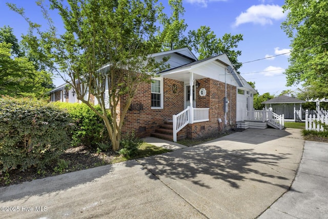 1205 Logan Ct, Jacksonville, NC 28540 - view of front of property with brick siding and driveway