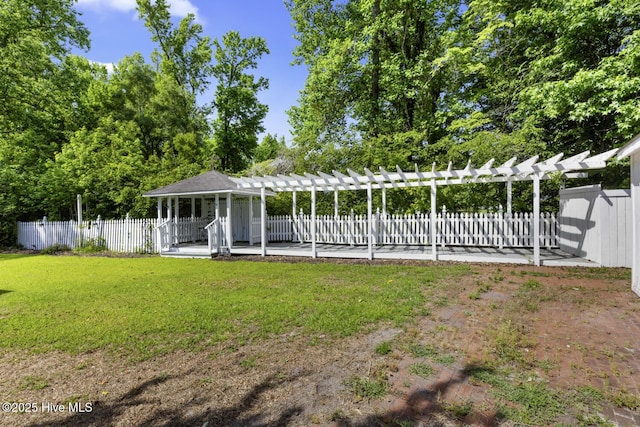 1205 Logan Ct, Jacksonville, NC 28540 - view of yard featuring a pergola and a patio