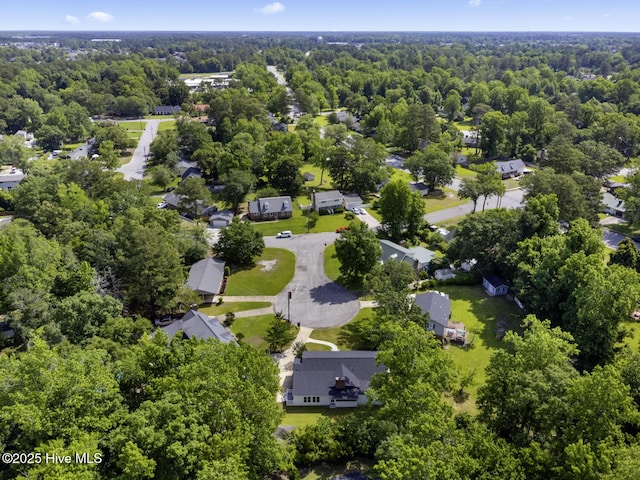 1205 Logan Ct, Jacksonville, NC 28540 - aerial view of residential area featuring a heavily wooded area