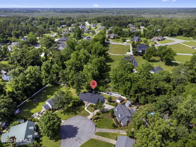 1205 Logan Ct, Jacksonville, NC 28540 - aerial view of property and surrounding area with nearby suburban area and a forest