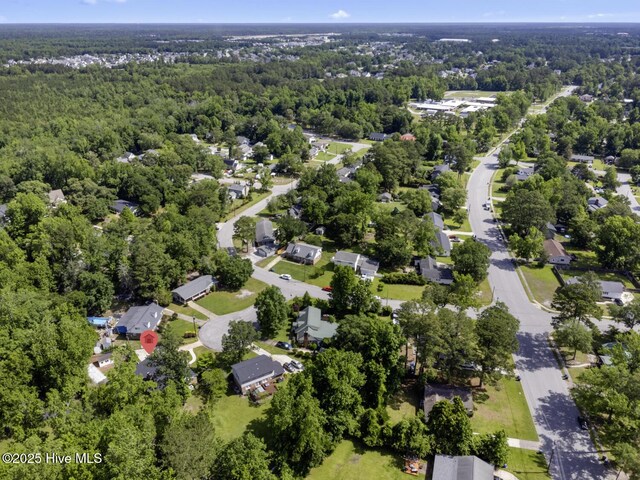 1205 Logan Ct, Jacksonville, NC 28540 - aerial view of property and surrounding area featuring a forest