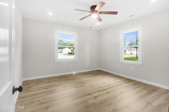 208 Buck Ln, Vanceboro, NC 28586 - unfurnished room featuring crown molding, light wood finished floors, a ceiling fan, and recessed lighting
