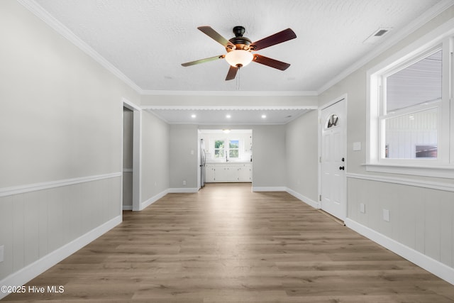 208 Buck Ln, Vanceboro, NC 28586 - spare room with wood finished floors, a ceiling fan, and ornamental molding