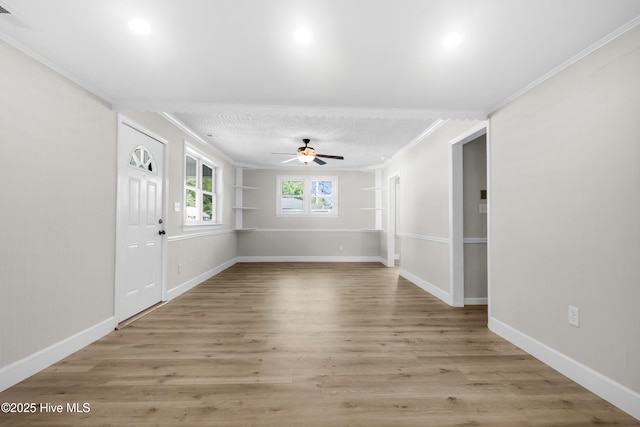 208 Buck Ln, Vanceboro, NC 28586 - empty room with ornamental molding, a ceiling fan, and light wood-style flooring