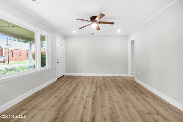 208 Buck Ln, Vanceboro, NC 28586 - spare room with a ceiling fan, ornamental molding, light wood-type flooring, and recessed lighting
