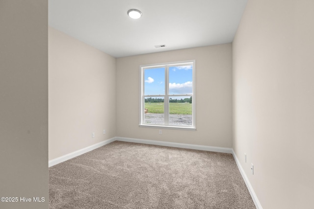 411 Fore Pl, Jacksonville, NC 28540 - carpeted spare room with baseboards