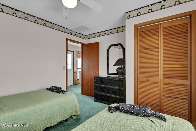 308 N Shore Dr E, Sunset Beach, NC 28468 - carpeted bedroom featuring a closet and a ceiling fan
