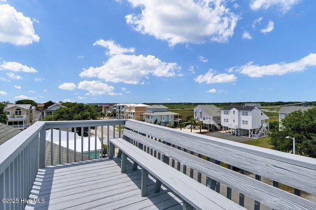 308 N Shore Dr E, Sunset Beach, NC 28468 - deck featuring a residential view