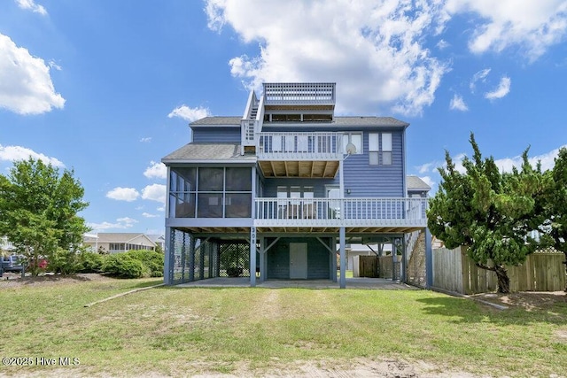 308 N Shore Dr E, Sunset Beach, NC 28468 - back of house with a carport, a sunroom, and a balcony