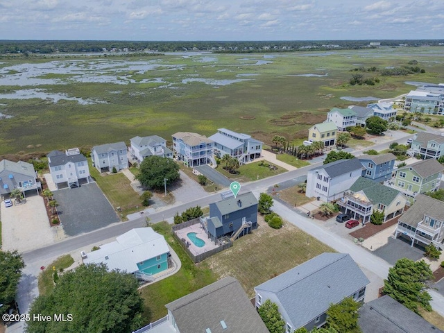 308 N Shore Dr E, Sunset Beach, NC 28468 - aerial perspective of suburban area with a nearby body of water