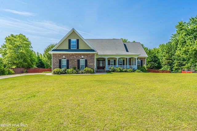 600 Booth Pond Rd, Raeford, NC 28376 - view of front of home featuring brick siding and covered porch