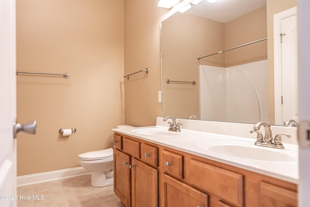 600 Booth Pond Rd, Raeford, NC 28376 - full bath featuring toilet, baseboards, double vanity, tile patterned floors, and a shower