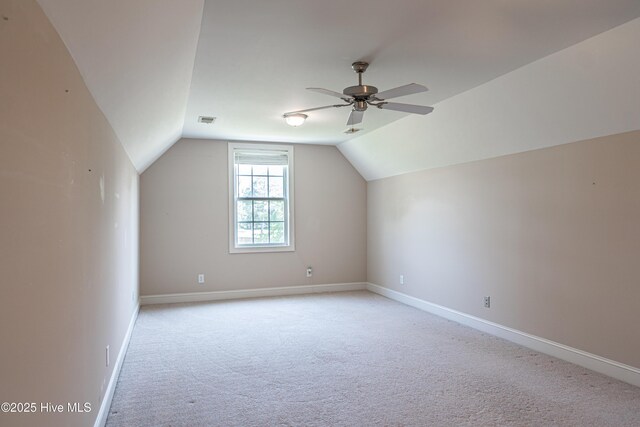 600 Booth Pond Rd, Raeford, NC 28376 - additional living space with light colored carpet, lofted ceiling, a ceiling fan, and baseboards