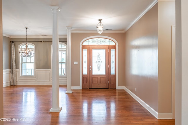 600 Booth Pond Rd, Raeford, NC 28376 - entryway featuring wood finished floors, crown molding, and a chandelier
