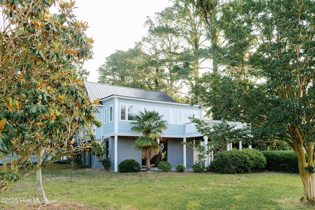 1498 Bayview Rd, Bath, NC 27808 - view of front of home featuring a front yard, metal roof, and a deck