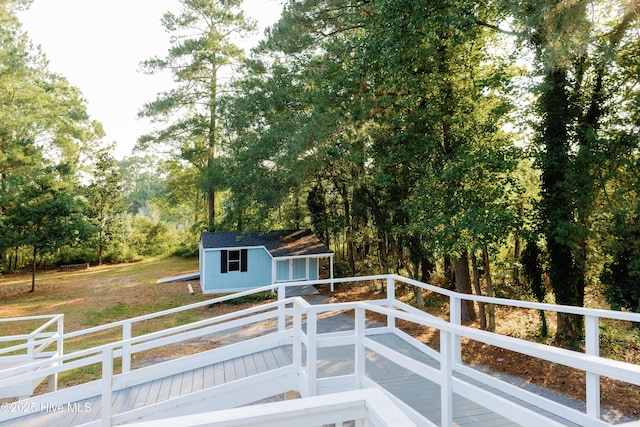 1498 Bayview Rd, Bath, NC 27808 - wooden deck featuring a lawn and view of scattered trees