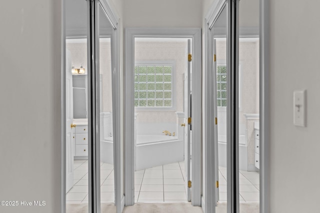 6304 Wolfhead Ct, Wilmington, NC 28411 - corridor with light tile patterned floors
