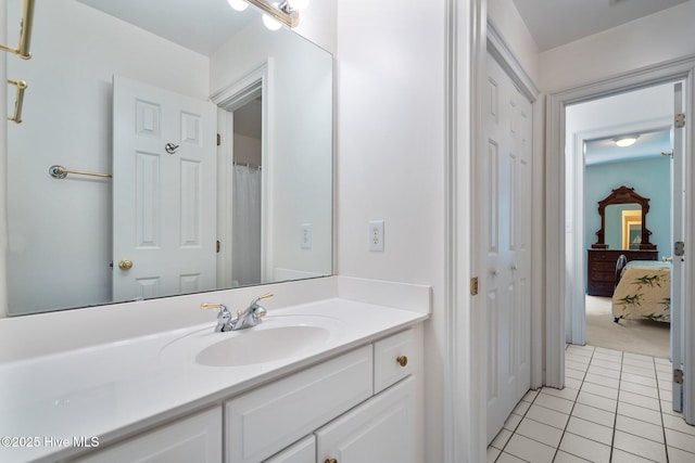 6304 Wolfhead Ct, Wilmington, NC 28411 - full bath featuring tile patterned flooring, vanity, and ensuite bath