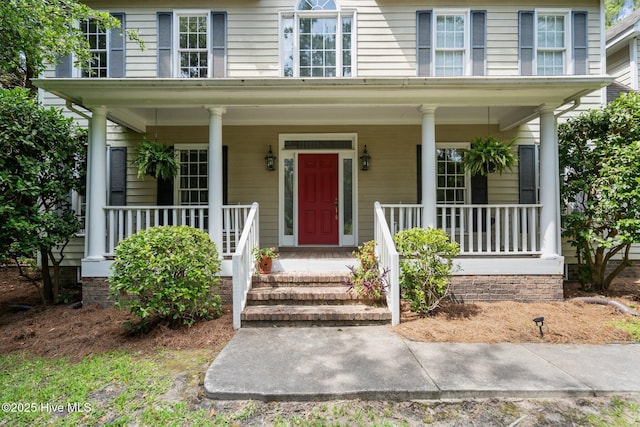 6304 Wolfhead Ct, Wilmington, NC 28411 - view of front of property featuring a porch