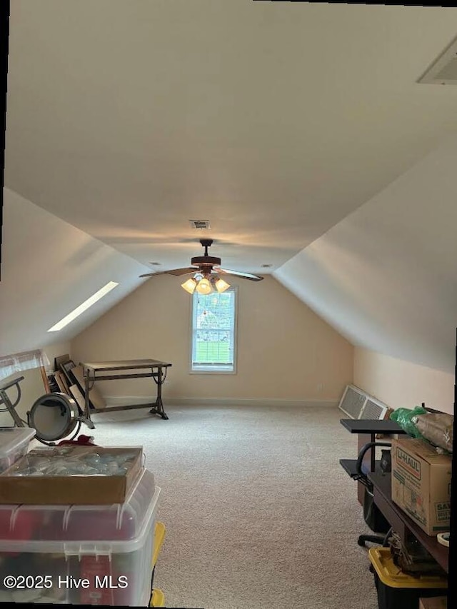211 Tidewater Dr, Newport, NC 28570 - bonus room featuring carpet, a ceiling fan, and vaulted ceiling