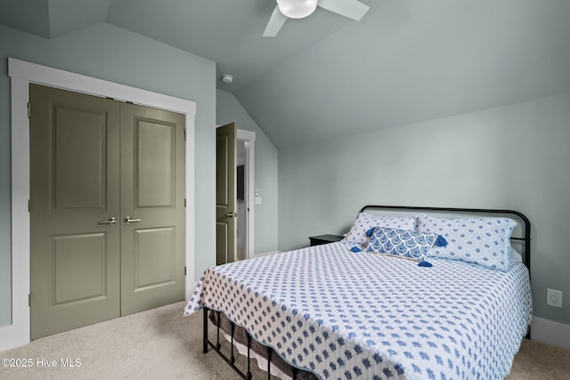 633 Ashbury Dr SE, Bolivia, NC 28422 - carpeted bedroom with vaulted ceiling, a closet, and a ceiling fan