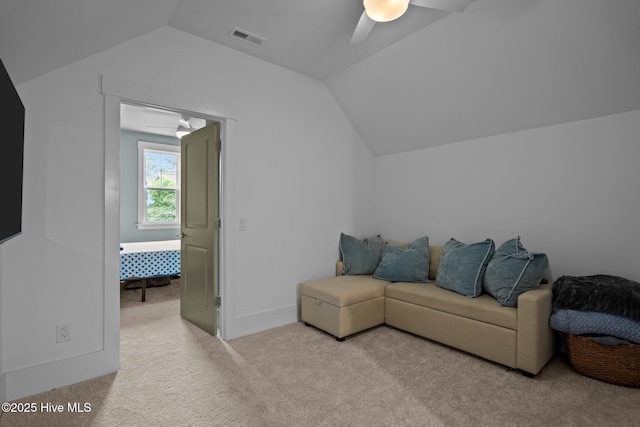 633 Ashbury Dr SE, Bolivia, NC 28422 - carpeted living area with lofted ceiling and ceiling fan