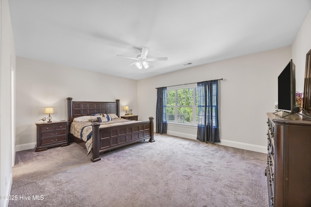 14 Allbrook Way, Hampstead, NC 28443 - bedroom with baseboards, carpet flooring, and a ceiling fan