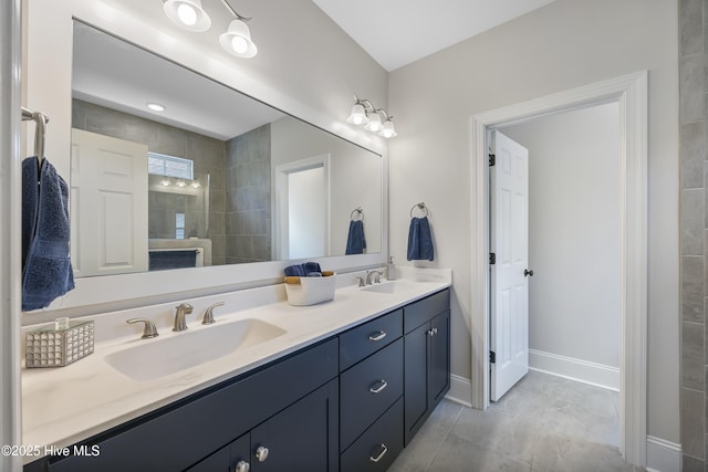 14 Allbrook Way, Hampstead, NC 28443 - bathroom featuring double vanity and baseboards