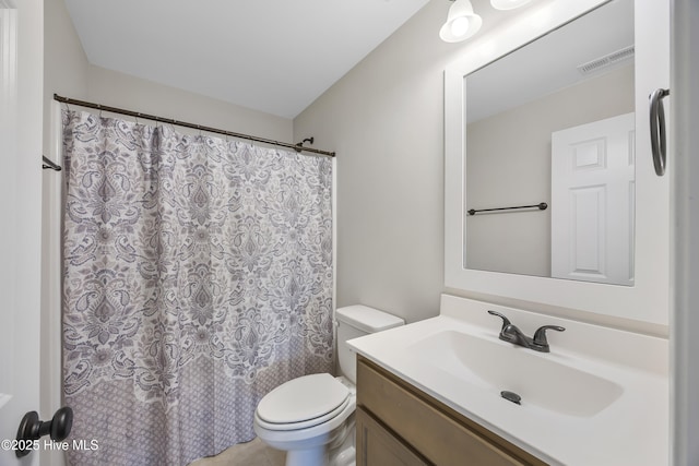 14 Allbrook Way, Hampstead, NC 28443 - bathroom featuring toilet, vanity, and a shower with shower curtain