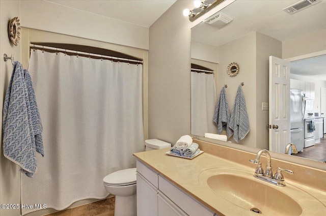 816 Colony Pl Unit D, Sunset Beach, NC 28468 - full bathroom with toilet, vanity, and a shower with curtain
