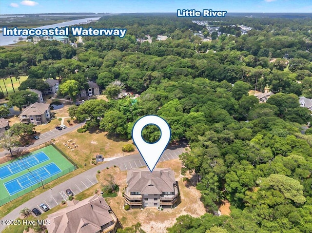 816 Colony Pl Unit D, Sunset Beach, NC 28468 - drone / aerial view of a forest