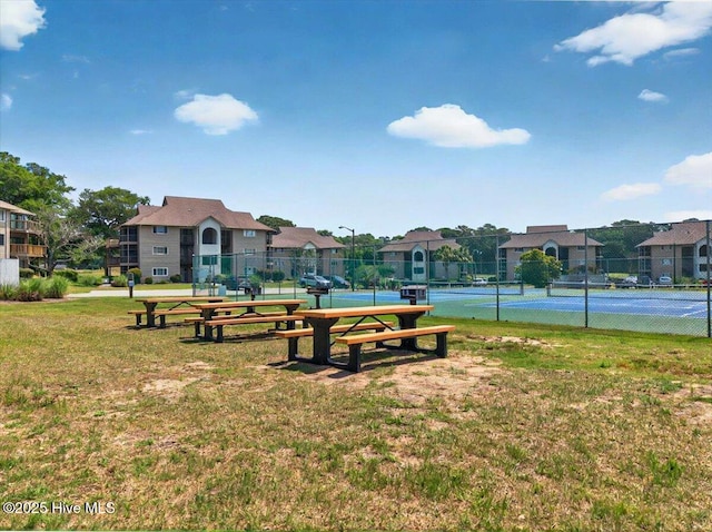 816 Colony Pl Unit D, Sunset Beach, NC 28468 - view of community with a tennis court and a residential view