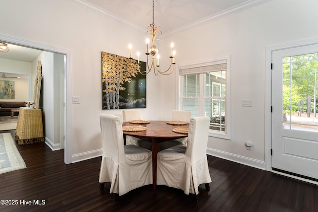 10 Linville Dr, Pinehurst, NC 28374 - dining space featuring a chandelier, dark wood finished floors, baseboards, and crown molding