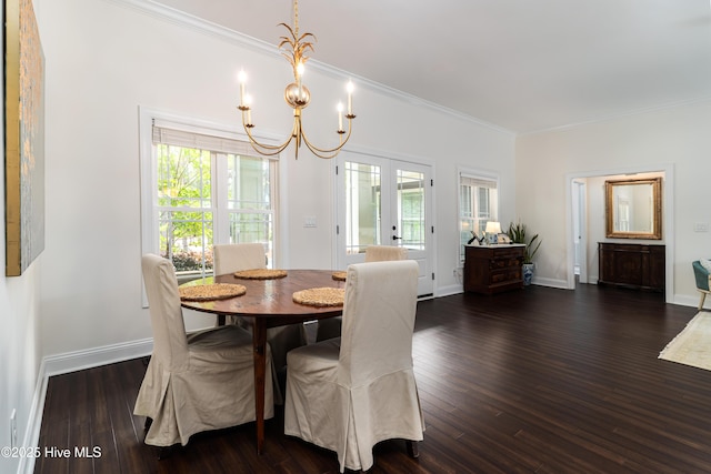 10 Linville Dr, Pinehurst, NC 28374 - dining room featuring crown molding, a chandelier, dark wood-type flooring, and baseboards