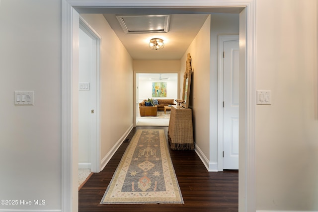 10 Linville Dr, Pinehurst, NC 28374 - corridor featuring dark wood-style flooring, baseboards, and attic access