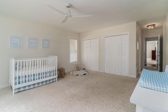 10 Linville Dr, Pinehurst, NC 28374 - carpeted bedroom with multiple closets, baseboards, and ceiling fan