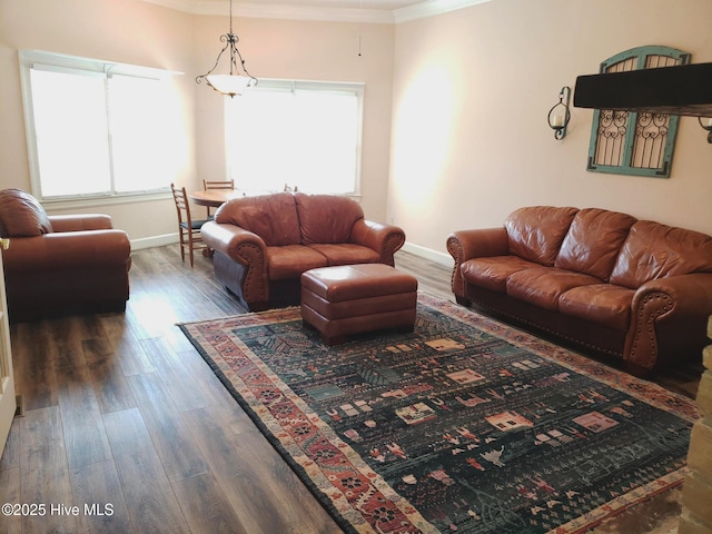 3902 Little John Dr N, Wilson, NC 27896 - living area with ornamental molding, wood finished floors, and baseboards